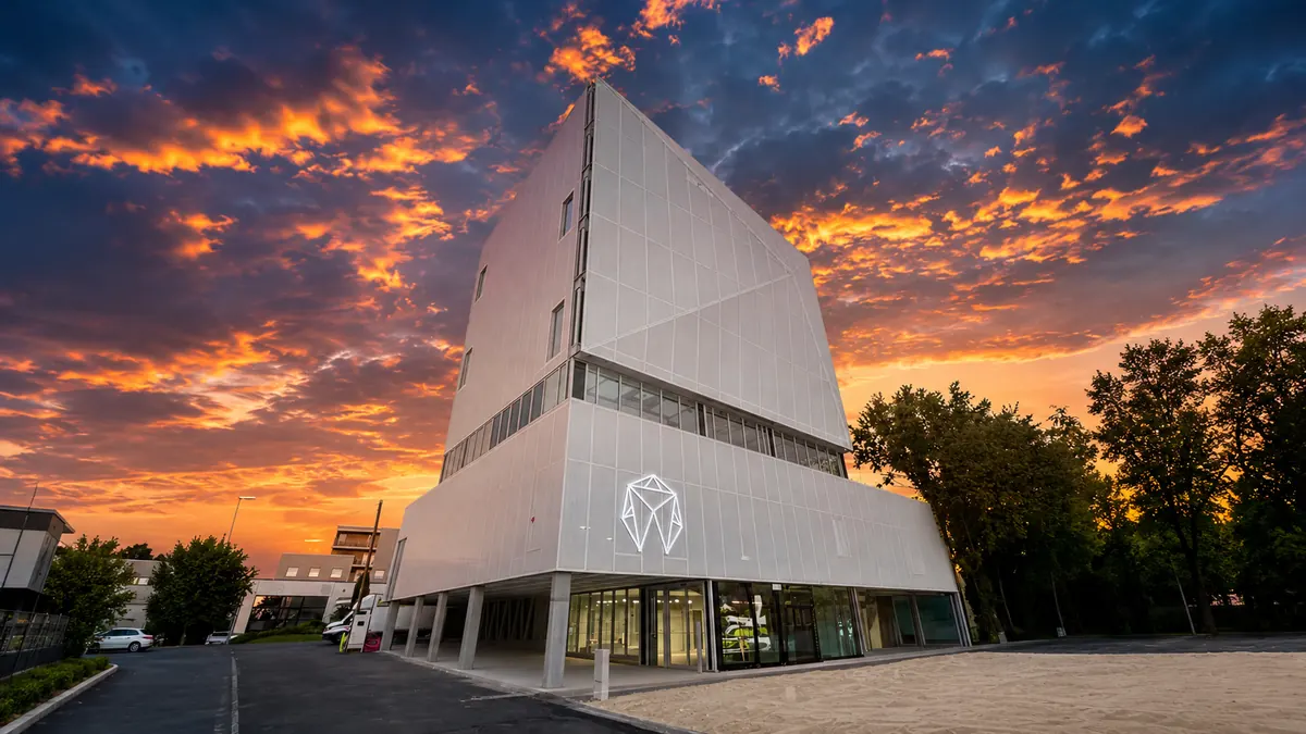 Modern dental clinic building in France at sunset