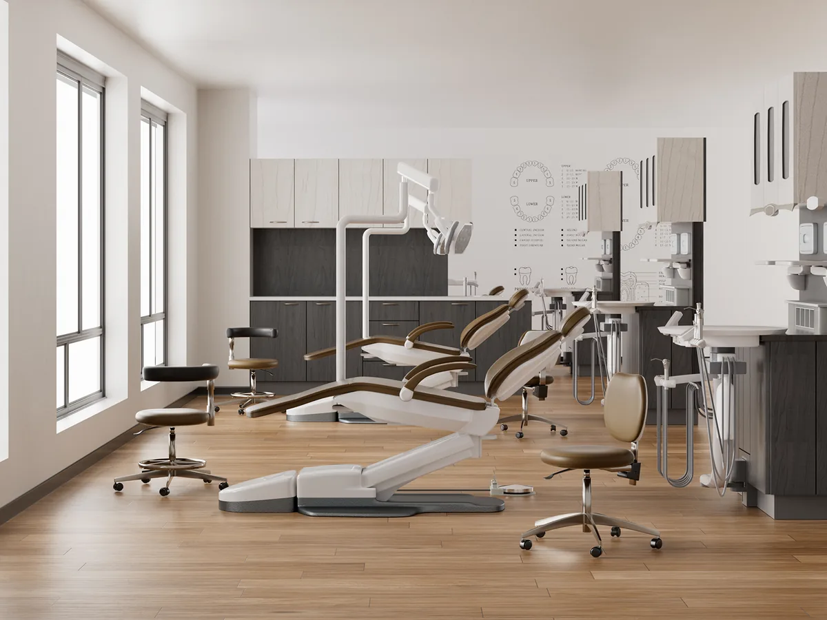 Renovated dental clinic room with chairs, cabinets, and wood flooring