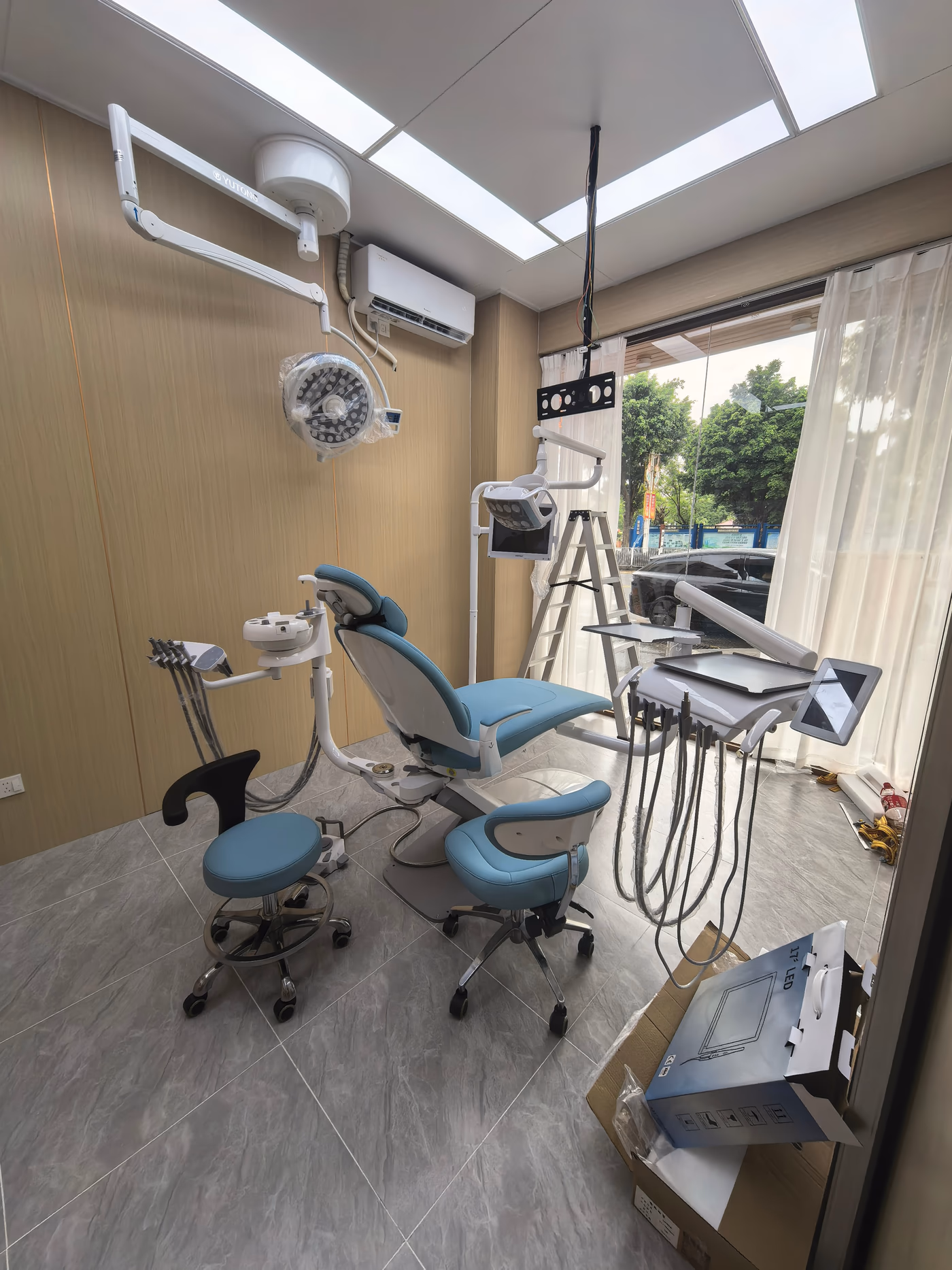 B100L Galaxy dental chair with blue upholstery in a real clinic installation