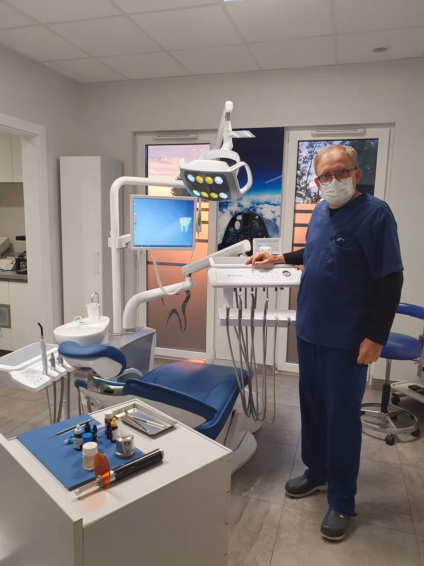 M100(L) dental chair operator workspace in a real clinic installation