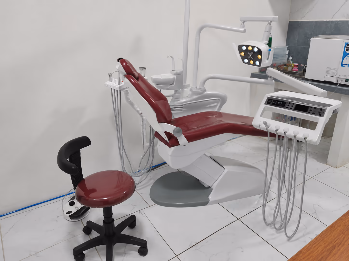P2 dental chair in a supplied finished treatment-room reference image