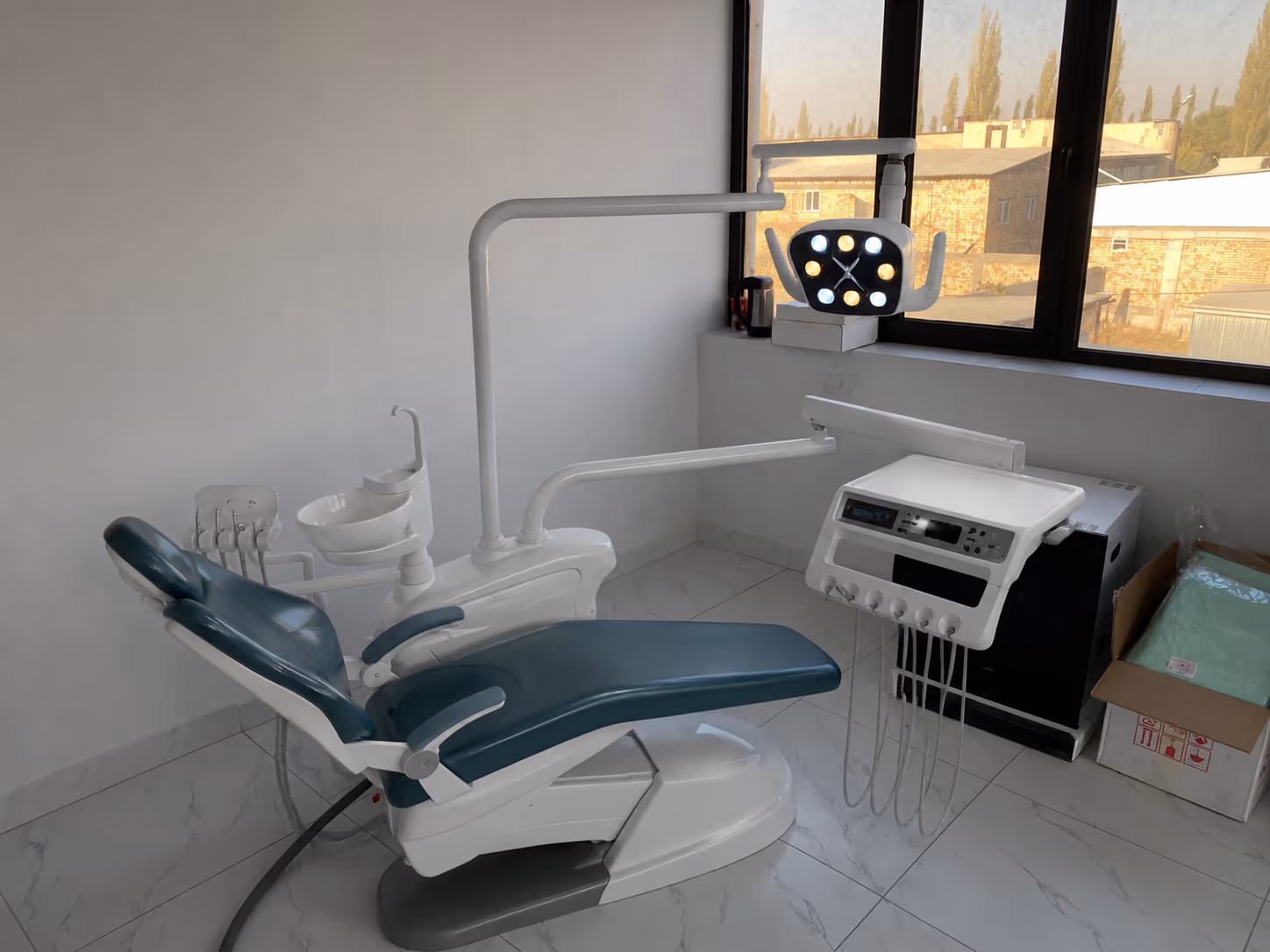 P2 dental chair in a supplied finished treatment-room reference image