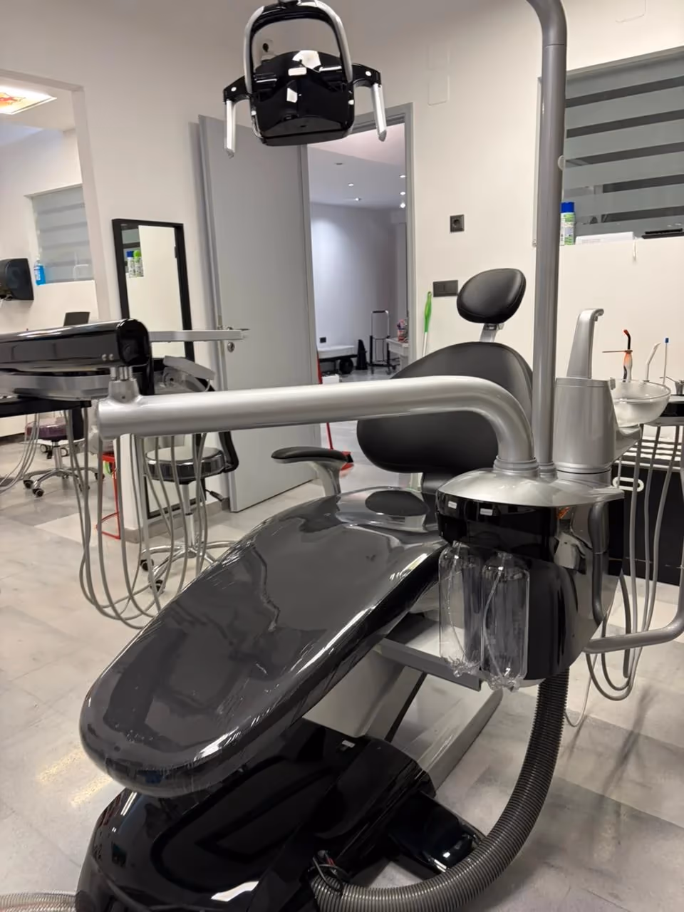 V3-Black dental chair clean clinical layout in a real clinic installation